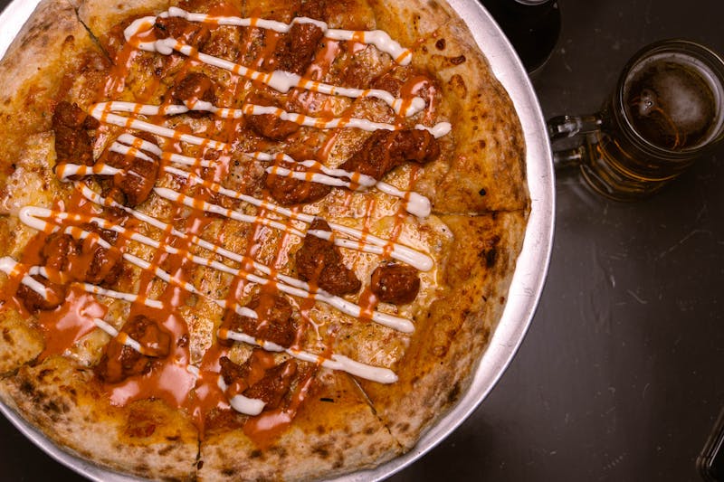 Buffalo Chicken ranch pizza with spicy buffalo sauce