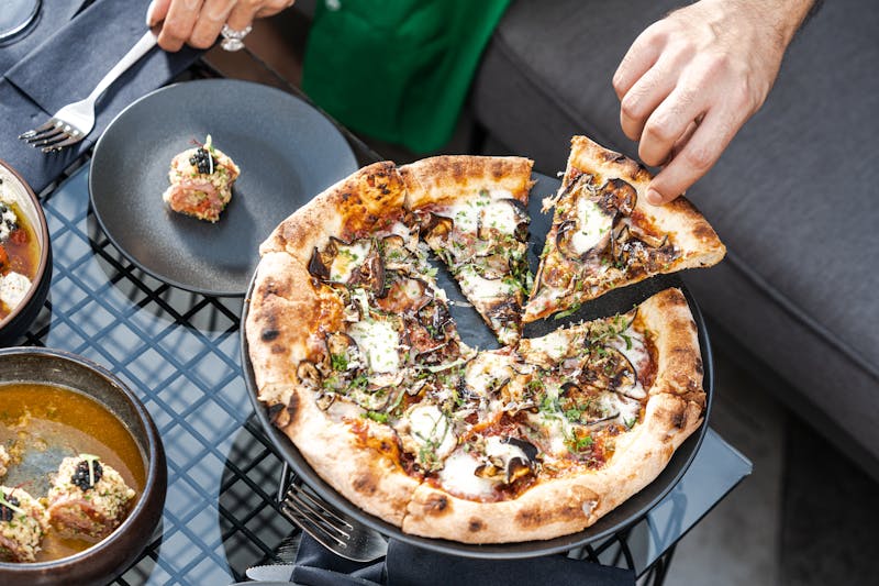 Truffle Mushroom ranch pizza with black truffle oil