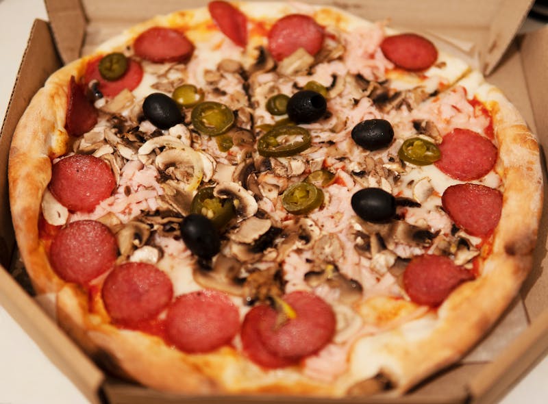 Tex-Mex Fiesta pizza with jalapeños and guacamole