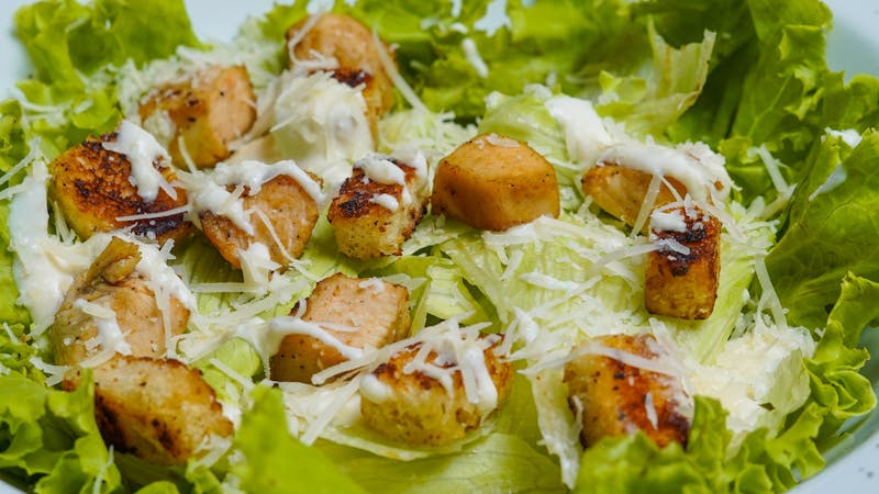 Caesar Salad with house dressing and parmesan crisps